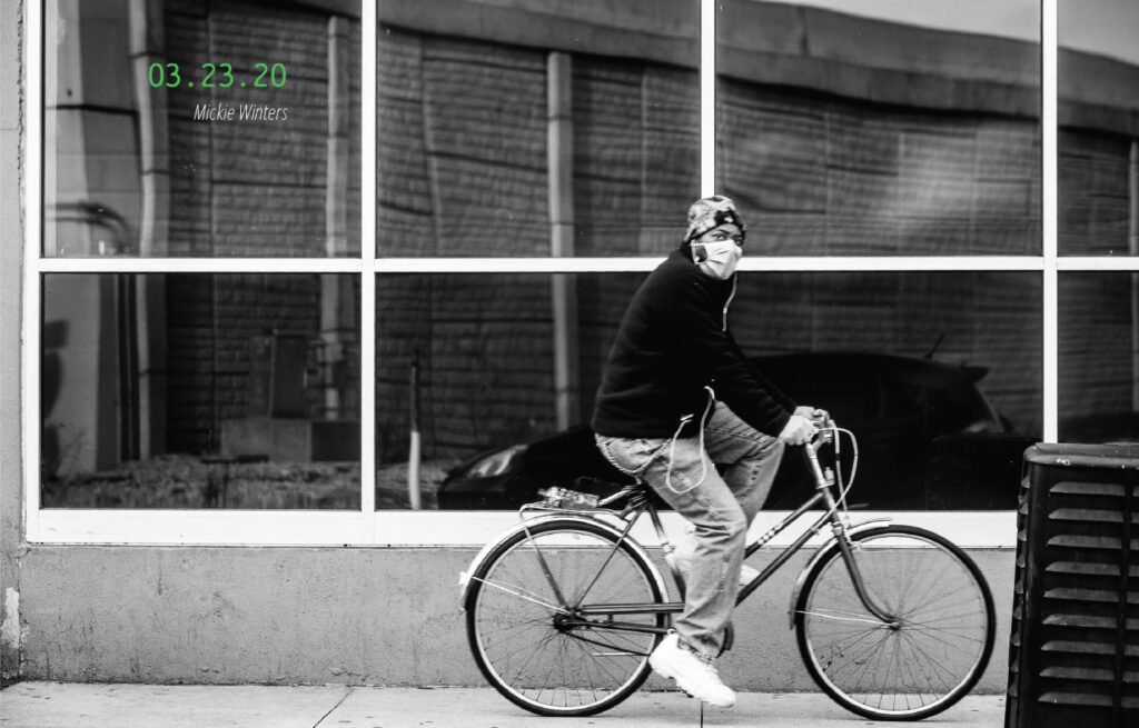 A bicyclist wearing a mask. 03.23.20, by Mickie Winters